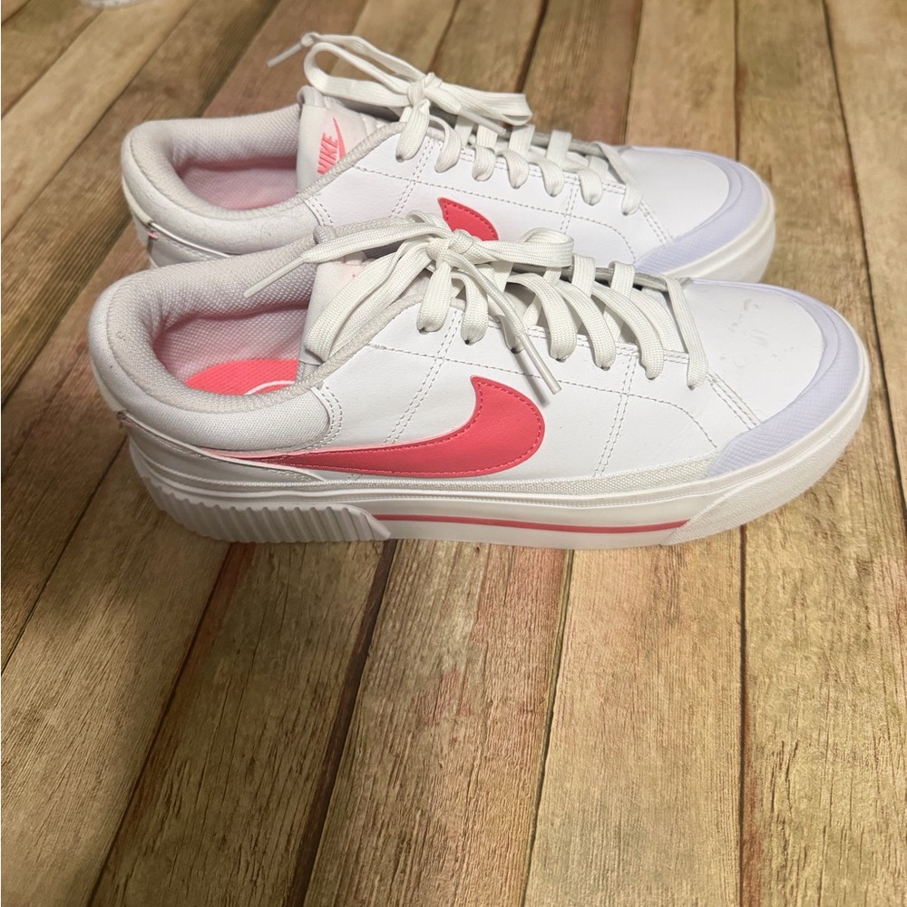 Nike White Low-Top Sneakers with Pink Swoosh